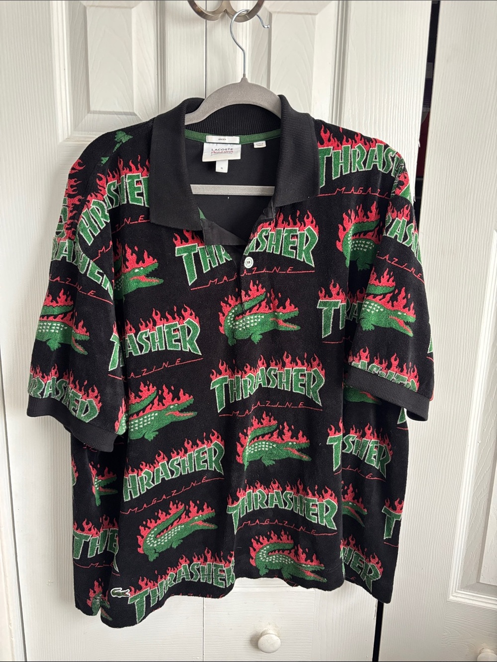 Lacoste Black Polo with Red & Green Thrasher Flame Print